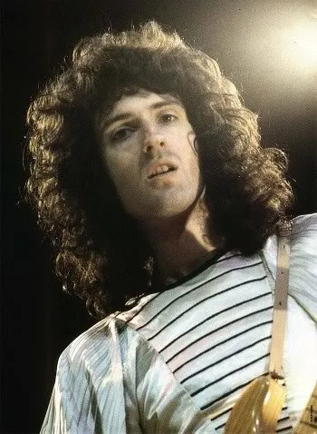Brian May playing guitar