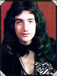 John Deacon performing